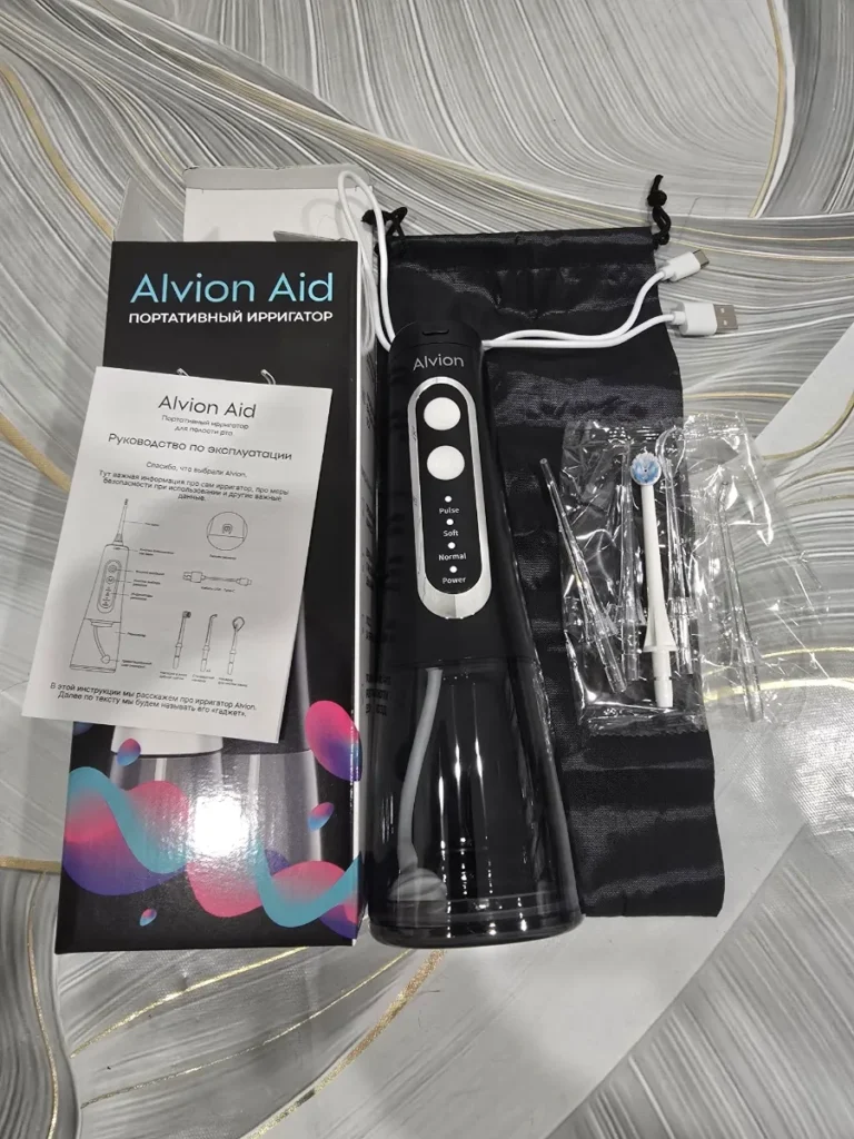 Фото ирригатора и насадок Aid Alvion